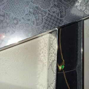 Taylor Swift Gold Necklace with Green Gem